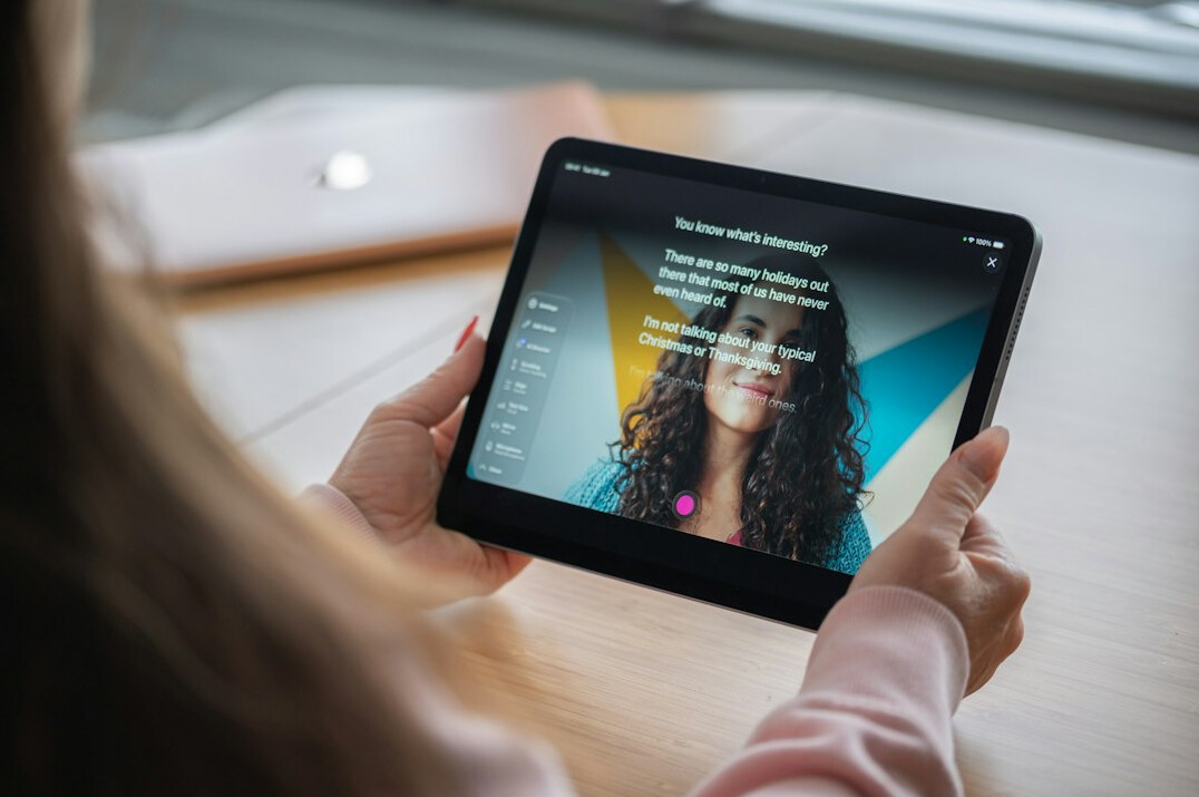 person watching streaming on tablet